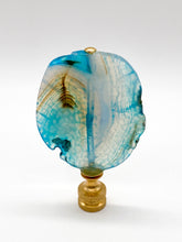 Load image into Gallery viewer, Blue agate mineral lamp finial with natural banding and translucent crystal patterns on a knurled brass fitting
