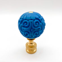 Load image into Gallery viewer, blue carved lamp finial, blue scroll pattern finial, carved blue sphere lamp finial, decorative blue finial with brass base, bold blue lamp finial with texture, vintage style blue carved finial, detailed scrollwork lamp finial blue, classic blue and brass finial, textured blue globe finial for lamp, statement blue finial for lighting decor