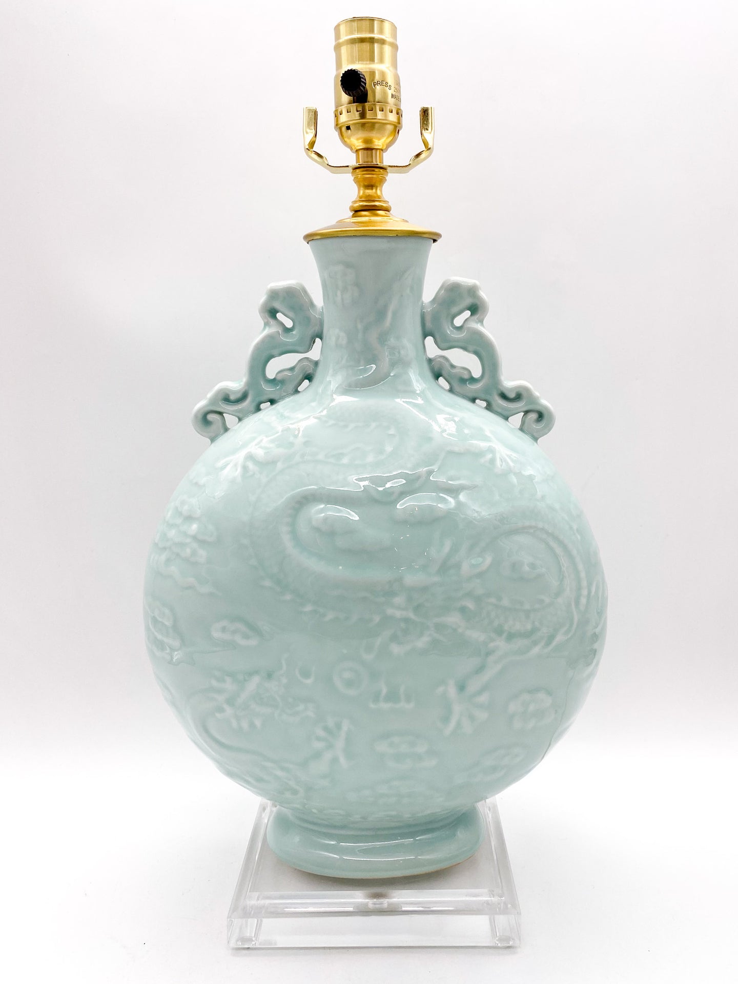 lamps, lamps store, lighting store, Dallas lampshade store, Dallas lamps, interior design Dallas, lampshade store, lampshades Dallas, porcelain lamp, celadon lamp, dragon pattern, dragon, relief, texture, rectangle base, light celadon, crackle glaze, wine bottle, Chinese wine bottle lamp