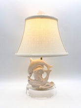 Load image into Gallery viewer, dolphin lamp, pair of dolphins, acrylic base, staring into each others eyes,  dolphins in delight, oval base, petit lamp, little table lamp, cute little lamp