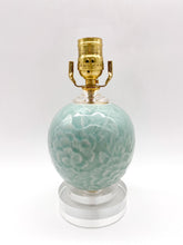 Load image into Gallery viewer, lamps, lamps store, lighting store, Dallas lampshade store, Dallas lamps, interior design Dallas, lampshade store, lampshades Dallas, celadon lamp, Chinese porcelain lamp, acrylic base, chrysanthemum detail, floral lamp, floral relief, jade green vase lamp, jade green