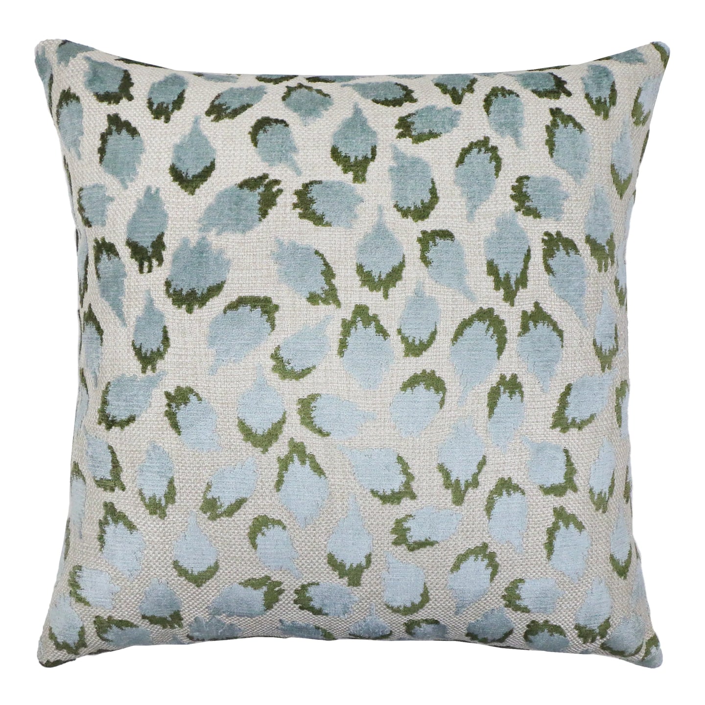 Decorative pillow with blue and green leaf pattern on a white background
