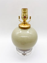 Load image into Gallery viewer, ceramic lamp, small ceramic lamp, petit ceramic lamp, crackle glaze ceramic, craquelure, melon shaped lamp, sphere lamp, spherical lamp, acrylic base, light green, dijon, Dallas lamp store, Dallas lampshade store, Dallas lighting store
