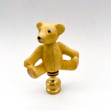 Load image into Gallery viewer, vintage porcelain bear lamp finial, teddy bear lamp finial detail, yellow porcelain bear finial with brass base, vintage teddy bear lamp topper, ceramic bear lamp finial with painted details, decorative bear finial for table lamp, collectible porcelain bear lamp finial, whimsical teddy bear lamp finial accent, classic bear figurine lamp finial, vintage style lamp finial with bear design, porcelain teddy bear with brass lamp finial base, playful bear lamp finial decor, neutral vintage bear finial for lamp, 