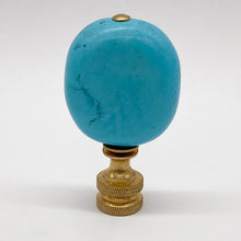 Load image into Gallery viewer, A turquoise cabochon ornament with a polished brass screw base, displayed on a clean white background.