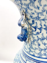 Load image into Gallery viewer, large blue and white chinese ceramic bell jar top urn with fou lion handles greek key and other hand painted design elements and patterns
