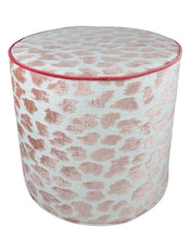 Load image into Gallery viewer, pink abstract blotchy pattern on white background with rose pink velvety piping removable slip cover cylindrical ottoman